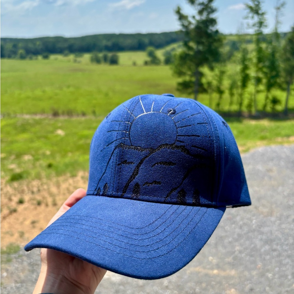 Blue Cap with Sun and Mountain Design